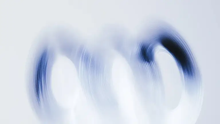 A soft blue and white abstract swirl