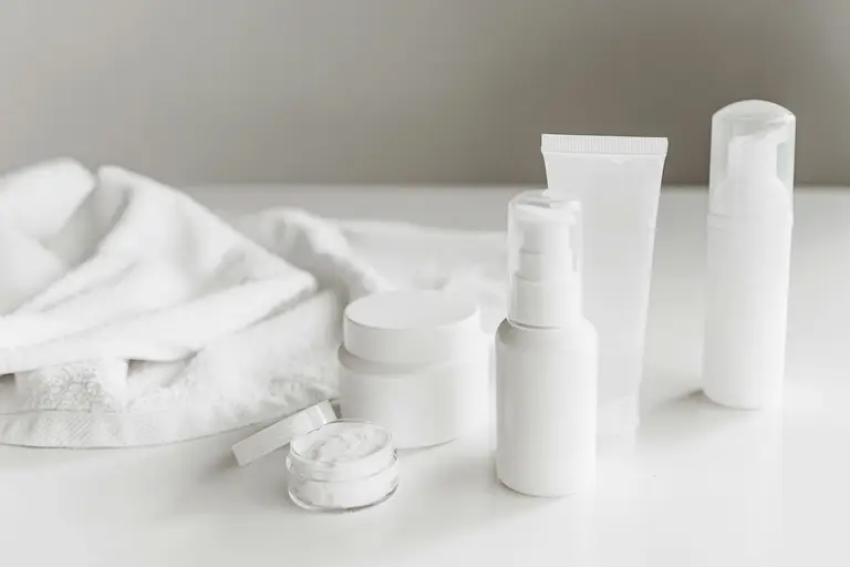 Skincare and supplement products on a vanity