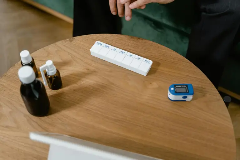Various magnesium supplement bottles arranged on a wooden surface